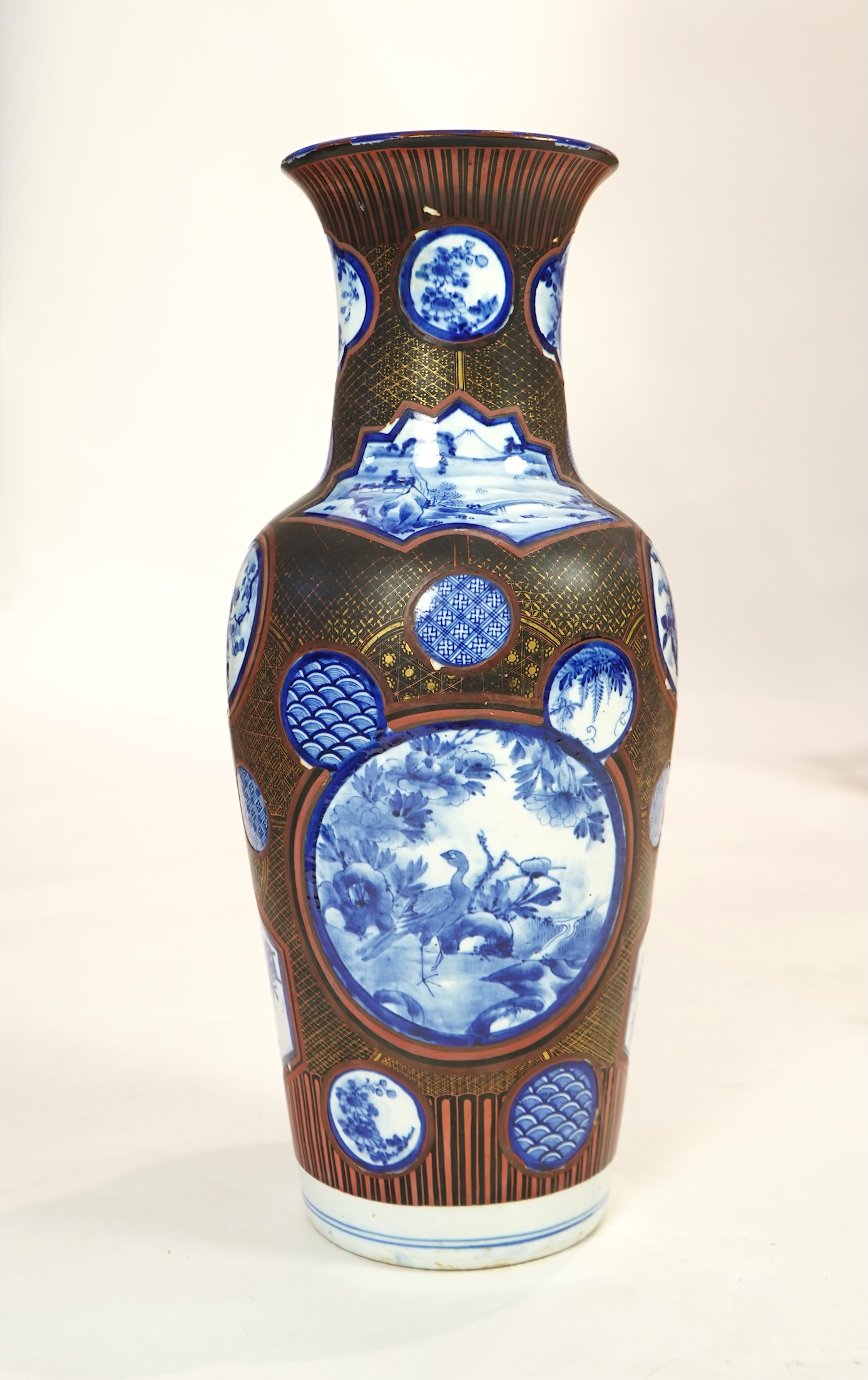 A large Japanese blue and white and gilt lacquered vase, late 19th century